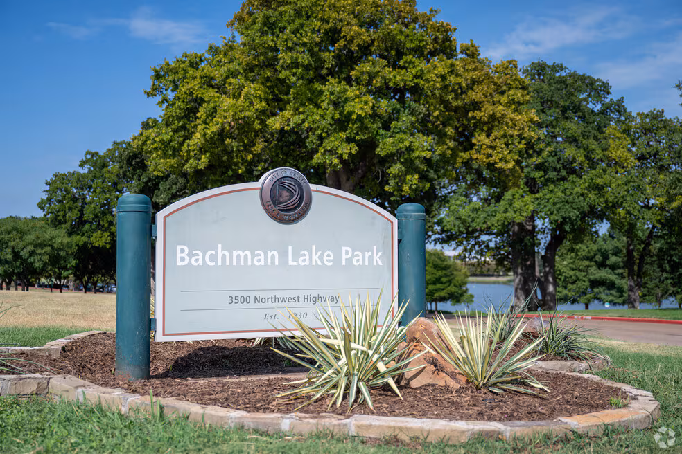 Bachman Lake Park sign with landscaping, located in Dallas, Texas, highlighting local landmark relevant to Bluffview HVAC services.