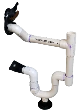 PVC piping assembly for a Dallas, TX air handler condensate drain system featuring a P-trap and marked outflow connection points
