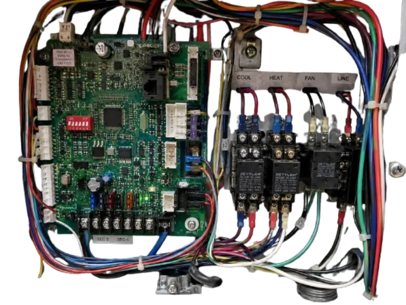 Circuit control board inside an air handler unit featuring Zettler relays and multicolored wiring bundles for system control